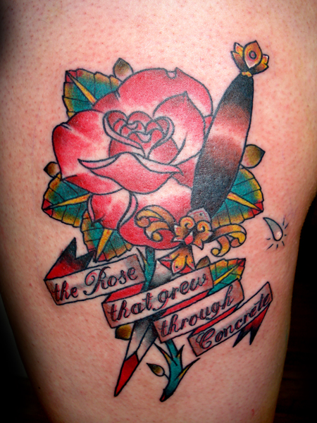 A little rose and dagger on a thigh This entry was posted in Tattoo and 