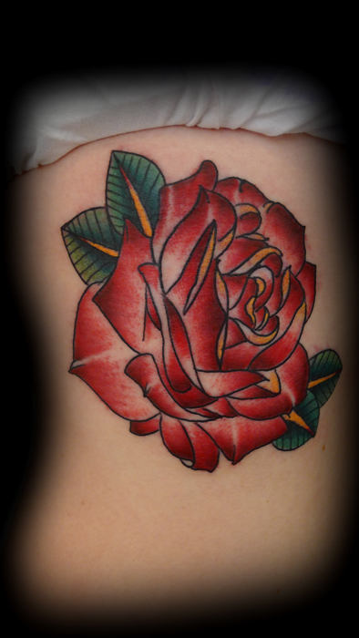 A nice rose for a first tattoo On the ribs but she sat well